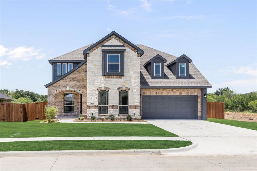 Front exterior of a new home in Sable Creek, Sanger, TX, highlighting curb appeal (Image 2). Front exterior of a new home in Sable Creek, Sanger, TX, highlighting curb appeal (Image 2).
