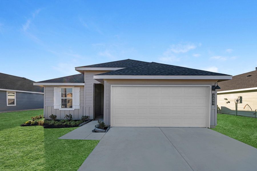 Front exterior of a new home in Reserve at Mallard Lakes, Orange, TX, highlighting curb appeal (Image 16). Front exterior of a new home in Reserve at Mallard Lakes, Orange, TX, highlighting curb appeal (Image 16).