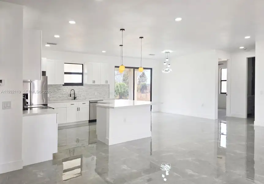 Furnished interior view inside a new home in , Clewiston (Image 6).