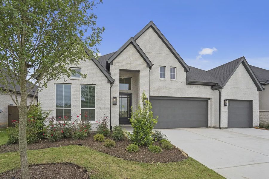 Front exterior of a new home in Attwater 65's, Waller, TX, highlighting curb appeal (Image 23).
