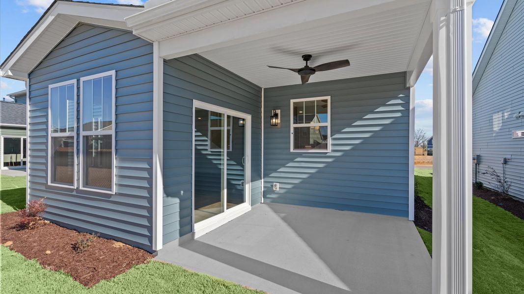 Superior curb appeal continues to the back with a refined, covered outdoor living space Superior curb appeal continues to the back with a refined, covered outdoor living space