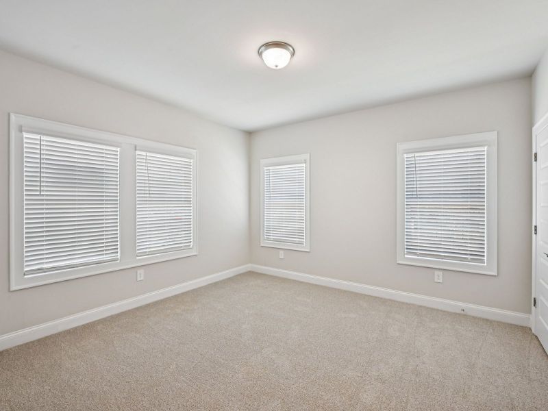 Spacious, unfurnished interior of a new home in Hemingway - Highland Series, Cumming (Image 16).
