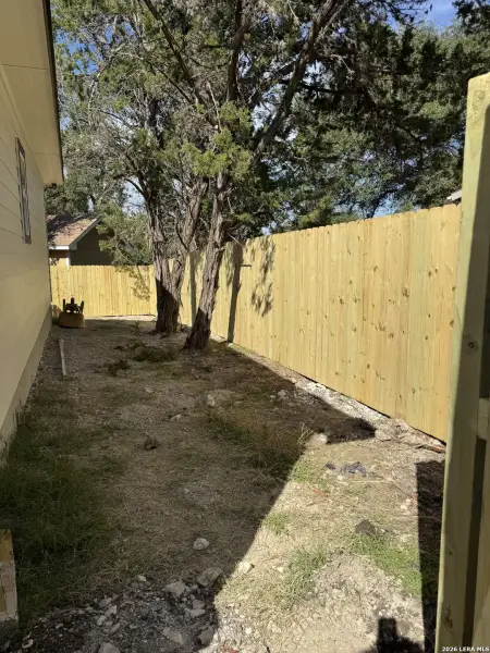 Exterior details and patio area of a home in , Spring Branch (Image 3).