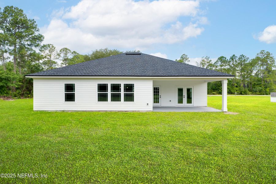Front exterior of a new home in , Middleburg, FL, highlighting curb appeal (Image 14). Front exterior of a new home in , Middleburg, FL, highlighting curb appeal (Image 14).