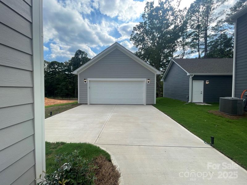 Rear, Detached, 2 Car Garage backs to trees and walking trail