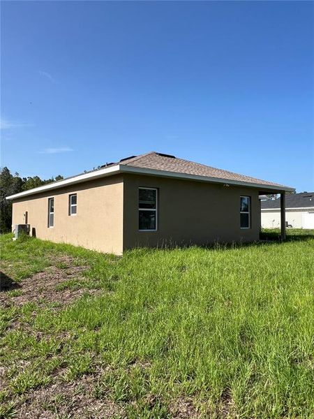 Front exterior of a new home in , Citrus Springs, FL, highlighting curb appeal (Image 20).