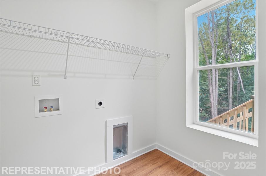 Bright Laundry Room - Representative Photo of Similar Home