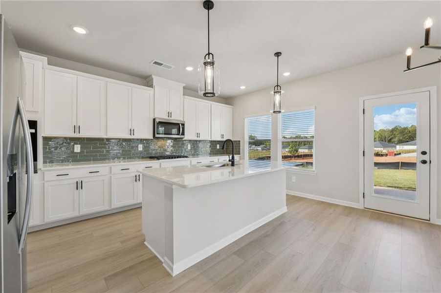 Furnished interior view inside a new home in Vines at Mill Creek - Estate Series, Braselton (Image 7). Furnished interior view inside a new home in Vines at Mill Creek - Estate Series, Braselton (Image 7).