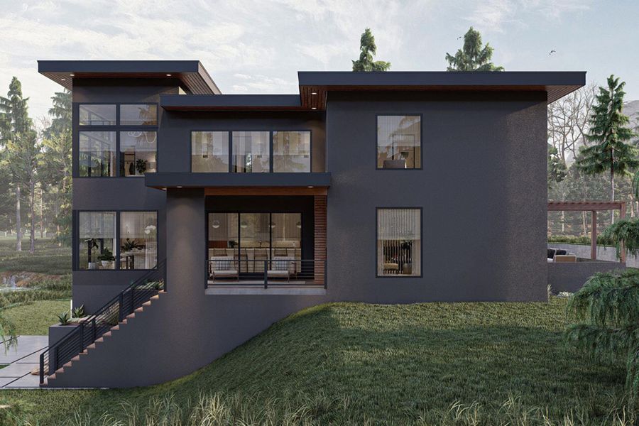 Rear view of property with stairs, stucco siding, and a lawn