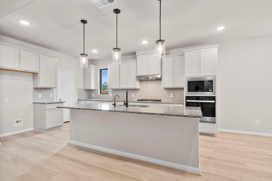 Furnished interior view inside a new home in Wildtree, Magnolia (Image 9).