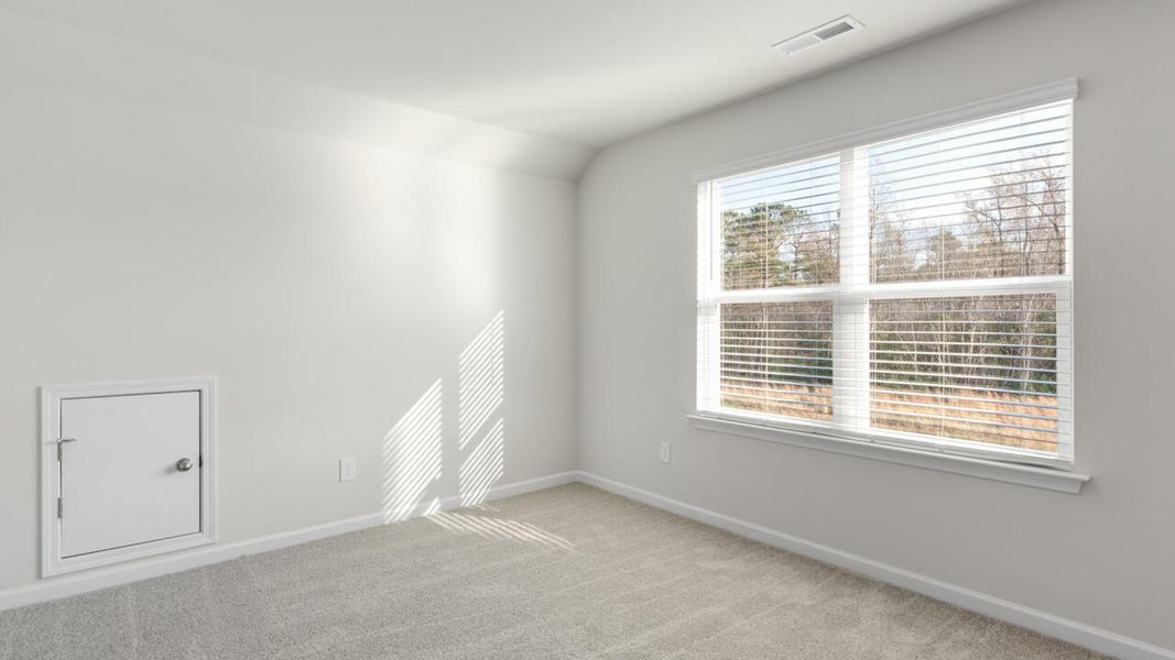 Spacious, unfurnished interior of a new home in Indigo Preserve, Leland (Image 30).
