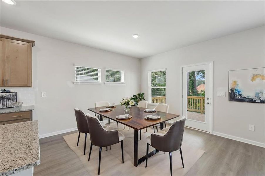 Furnished interior view inside a new home in Martin Springs - Estate Series, Lawrenceville (Image 12).