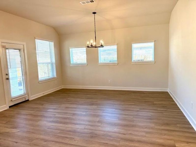 HUGE Dining area with beautiful windows!