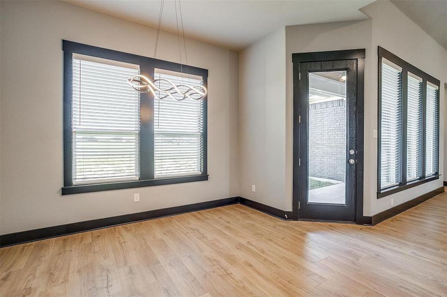 Unfurnished dining area with light hardwood / wood-style floors