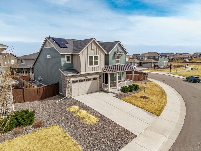 Front exterior of a new home in , Thornton, CO, highlighting curb appeal (Image 25). Front exterior of a new home in , Thornton, CO, highlighting curb appeal (Image 25).