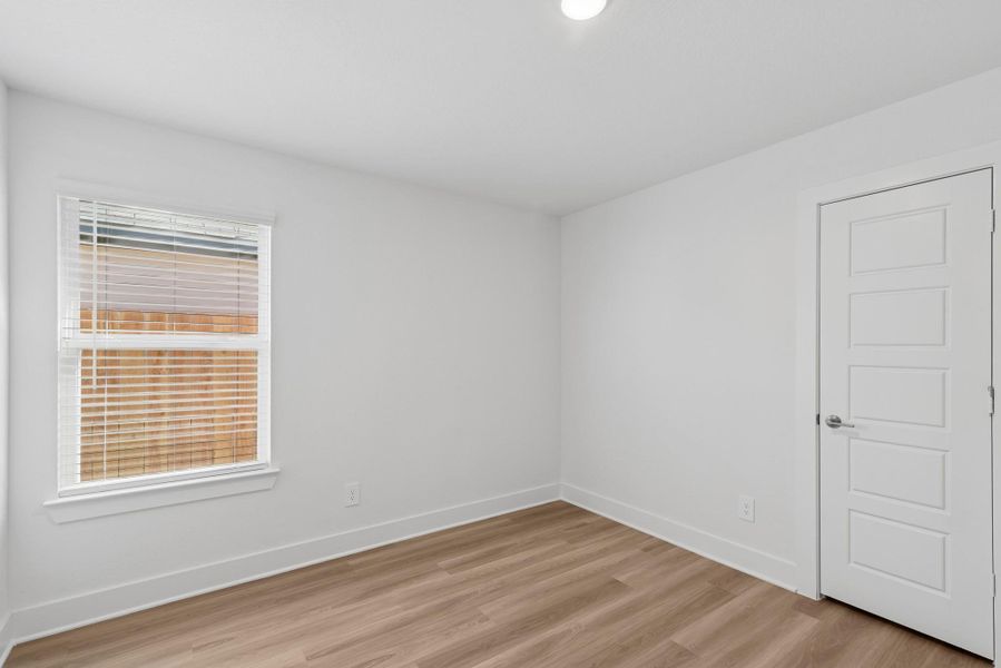 Spacious, unfurnished interior of a new home in Lone Star Landing, Montgomery (Image 17).