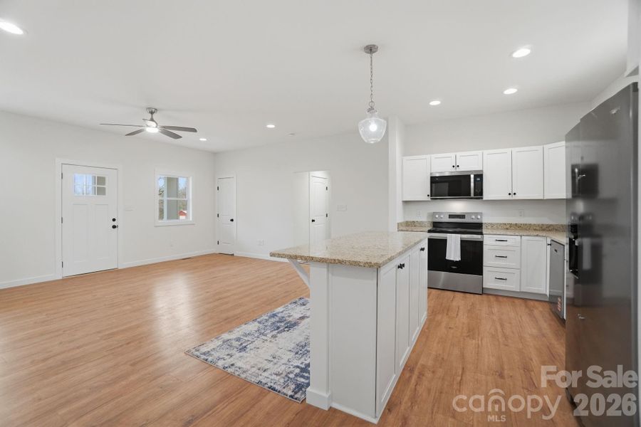 Furnished interior view inside a new home in , Newton (Image 6).