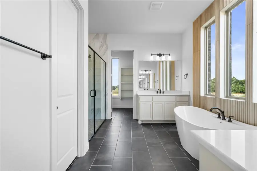 Representative furnished interior of a home built from the The Aylin by Doug Parr Custom Homes in Kessler Farms, Brock (Image 20).