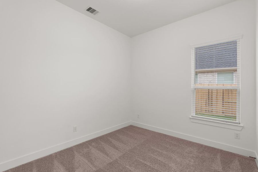 Representative unfurnished interior of a home built from the Palmer by Chesmar Homes in Riceland Alley Loads, Mont Belvieu (Image 35).
