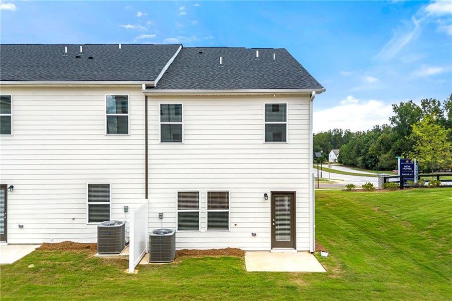 Exterior details and patio area of a home in The Grove At Mundy Mill, Gainesville (Image 4). Exterior details and patio area of a home in The Grove At Mundy Mill, Gainesville (Image 4).