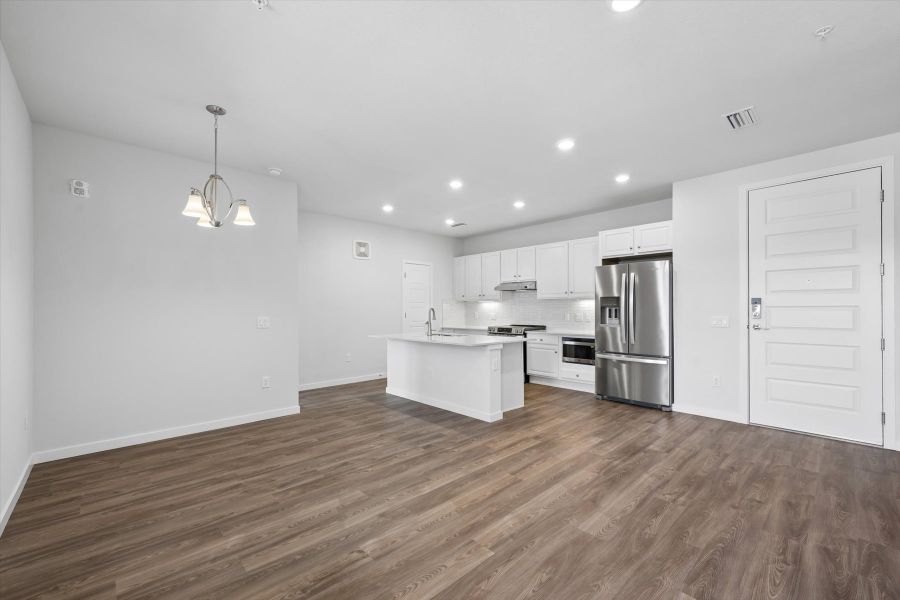 A kitchen with white cabinets. A kitchen with white cabinets.