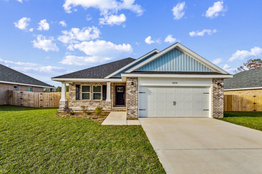 Representative exterior photo of a completed home built from the The Carlos by Herbst Homes in Doyle Hawkins Landing, Navarre, FL (Image 25).