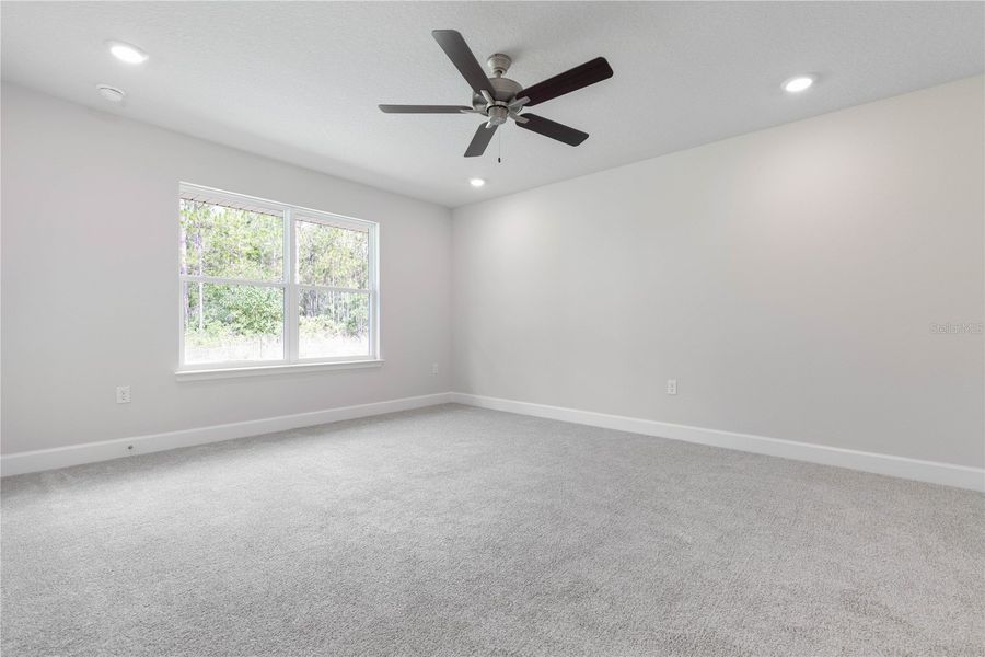 Spacious, unfurnished interior of a new home in Orange Blossom Hills, Summerfield (Image 25).