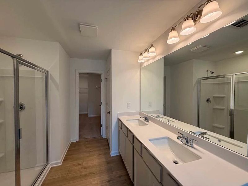 Primary Bathroom featuring Serene Collection Finishes