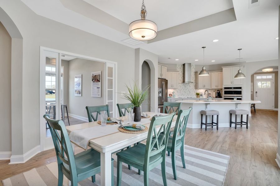 Representative furnished interior of a home built from the Portico by McKee Homes in The Cottages at 78 North, Sanford (Image 8).