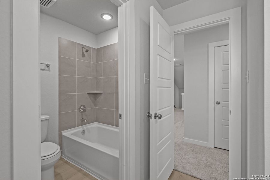 Furnished interior view inside a new home in Cinco Lakes, San Antonio (Image 9).