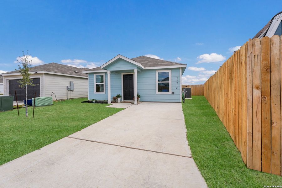 Exterior details and patio area of a home in Spring Grove, Converse (Image 24).