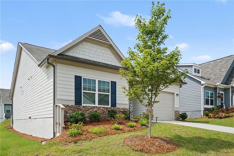 Front exterior of a new home in Villages at Cedar Hill, Dallas, GA, highlighting curb appeal (Image 22).