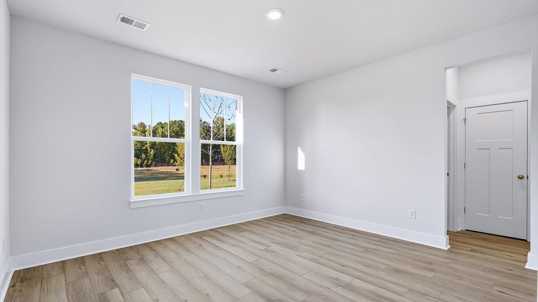 Primary suite that offers first-rate relaxation with established style and elevated finishes by DRB Homes Primary suite that offers first-rate relaxation with established style and elevated finishes by DRB Homes