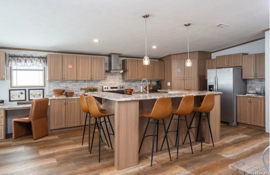 Furnished interior view inside a new home in , Elmendorf (Image 10).