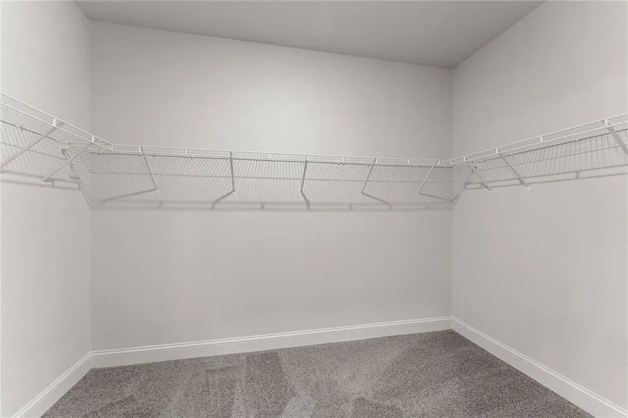 Representative unfurnished interior of a home built from the 1709 by Adams Homes in Chambers Landing, Commerce (Image 30).