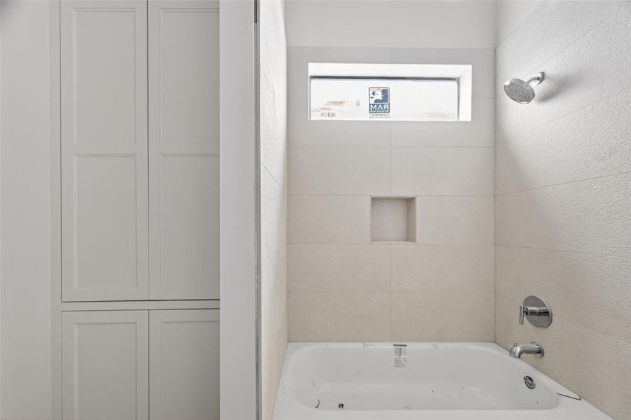 Nice sized shower. The doors on each side provide privacy for each perspective bedroom