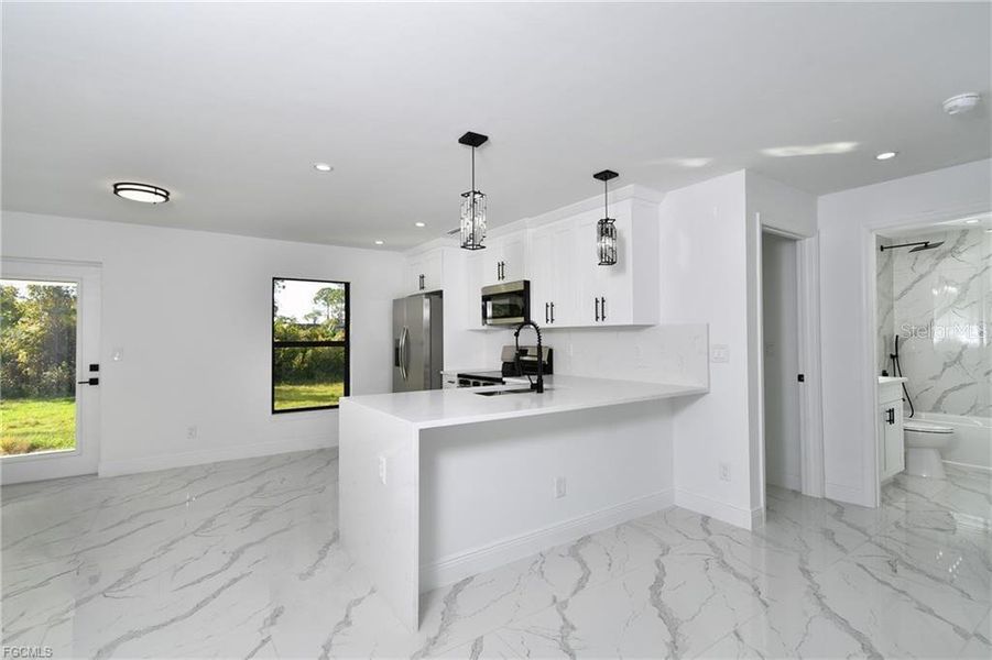 Furnished interior view inside a new home in , Lehigh Acres (Image 5). Furnished interior view inside a new home in , Lehigh Acres (Image 5).