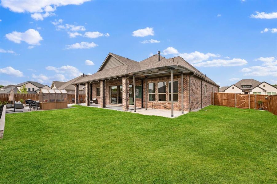 Exterior details and patio area of a home in , Van Alstyne (Image 22).