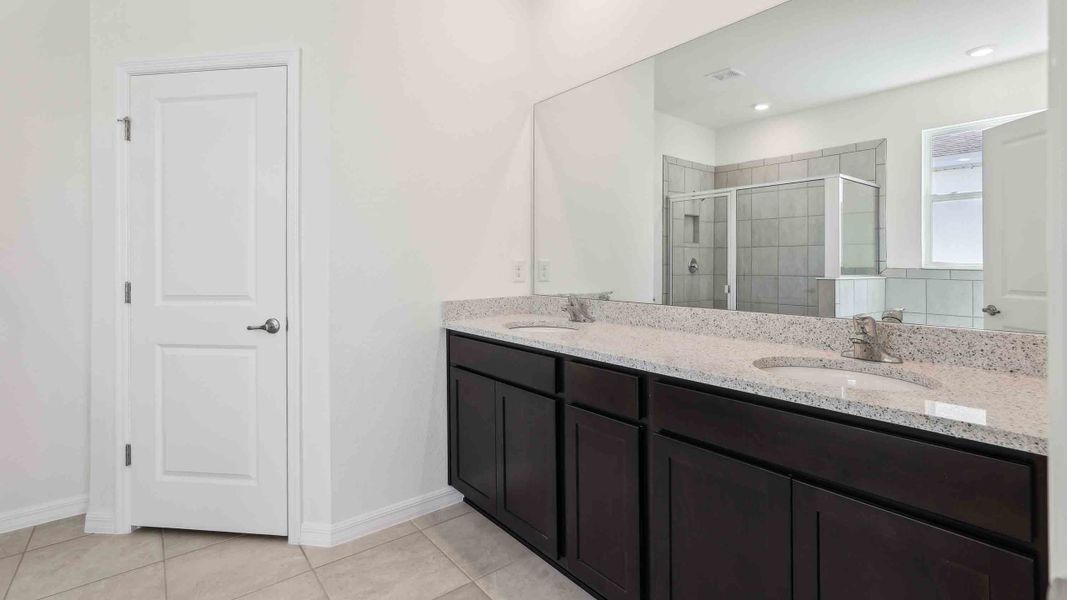 Representative furnished interior of a home built from the Laurel by D.R. Horton in Ocala Preserve, Ocala (Image 11).