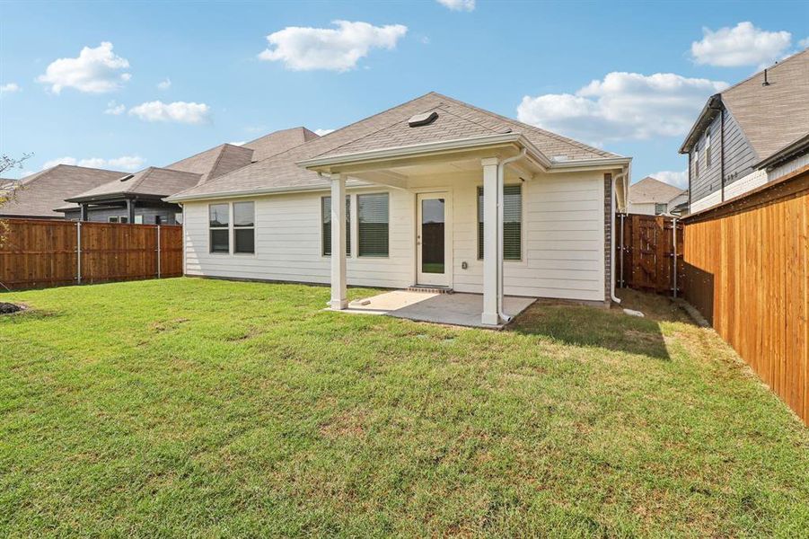 Exterior details and patio area of a home in Lakehaven - Signature Series, Farmersville (Image 21).
