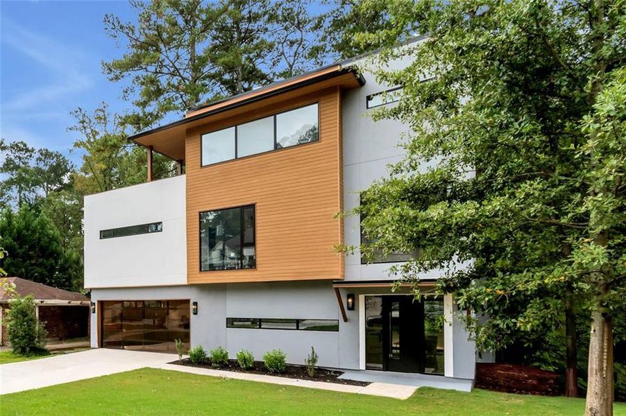 Front exterior of a new home in , Brookhaven, GA, highlighting curb appeal (Image 26). Front exterior of a new home in , Brookhaven, GA, highlighting curb appeal (Image 26).