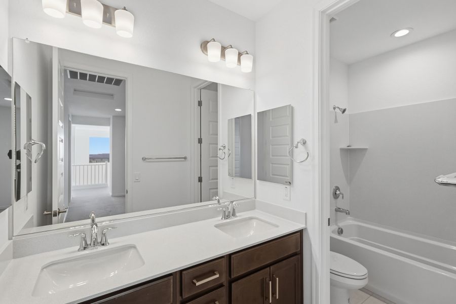 Representative furnished interior of a home built from the Triumph by Taylor Morrison in Artisan at Asante Encore Collection, Surprise (Image 12). Representative furnished interior of a home built from the Triumph by Taylor Morrison in Artisan at Asante Encore Collection, Surprise (Image 12).