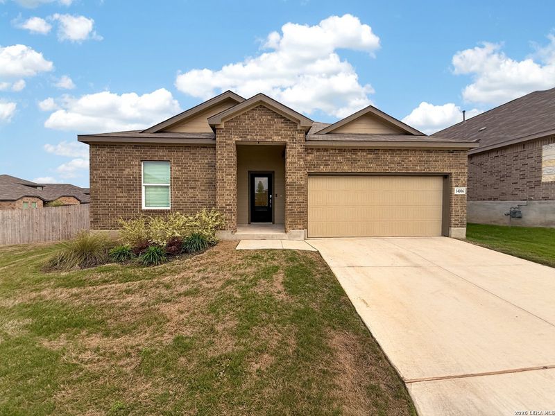 Front exterior of a new home in Brookmill, San Antonio, TX, highlighting curb appeal (Image 1). Front exterior of a new home in Brookmill, San Antonio, TX, highlighting curb appeal (Image 1).