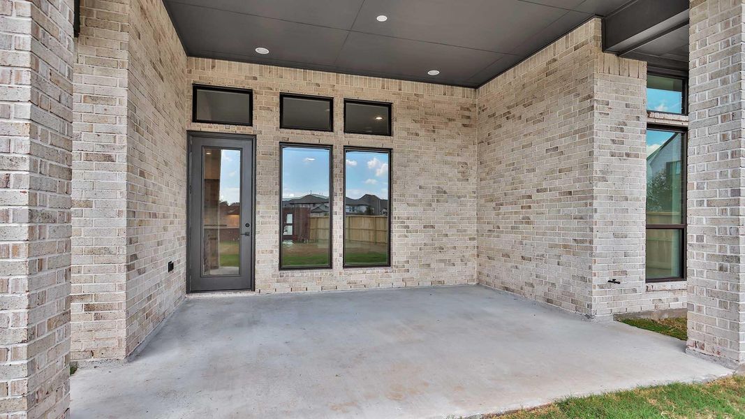 Exterior details and patio area of a home in Fulbrook On Fulshear Creek 60', Fulshear (Image 1).