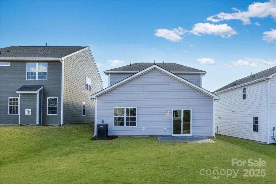 Exterior details and patio area of a home in Redhawk: Walk, Belmont (Image 4).