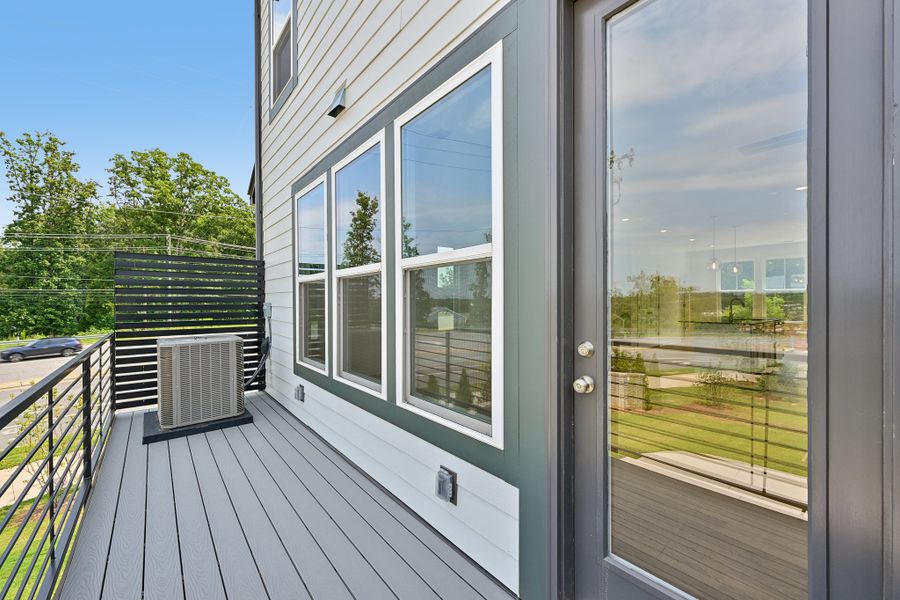 Exterior details and patio area of a home in Senata at Research Park, Charlotte (Image 4). Exterior details and patio area of a home in Senata at Research Park, Charlotte (Image 4).