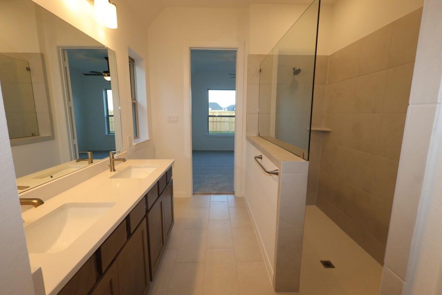 Furnished interior view inside a new home in Meridiana - Terrace Collection, Manvel (Image 2).