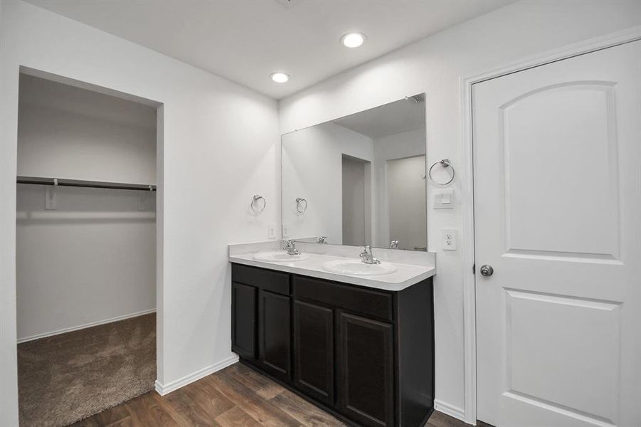 Ensuite bathroom in the primary bedroom.