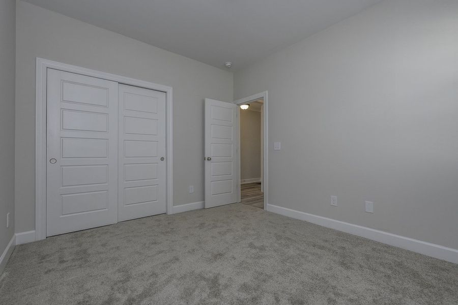 Representative unfurnished interior of a home built from the The Hunter by Cothran Homes in Holly Ridge, Greenville (Image 23).