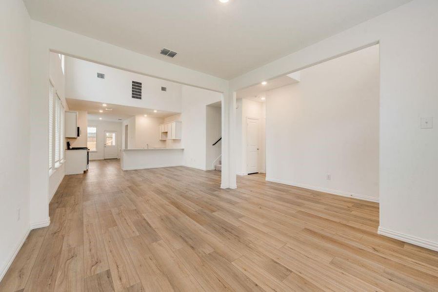 Unfurnished living room with light hardwood / wood-style flooring